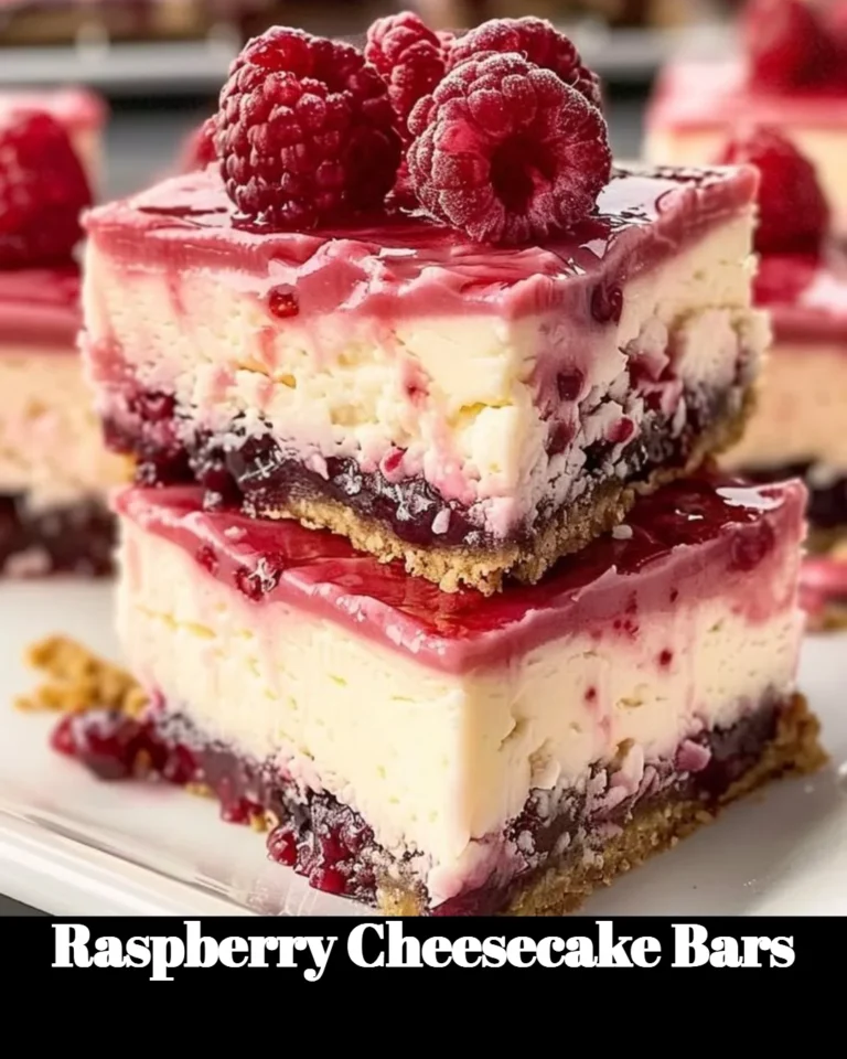 Delicious raspberry cheesecake bars topped with fresh raspberries.