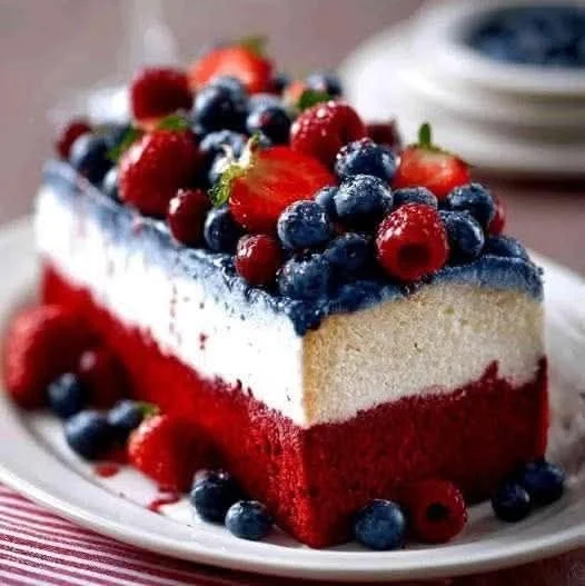 Festive Red, White & Blue Poke Cake decorated for summer celebrations