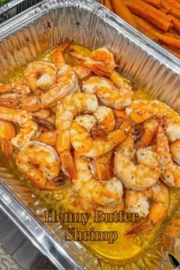 Delicious Henny Butter Shrimp served with a rich buttery sauce.