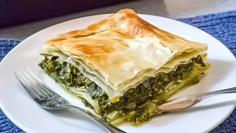 Homemade Spanakopita with flaky phyllo pastry and fresh spinach filling