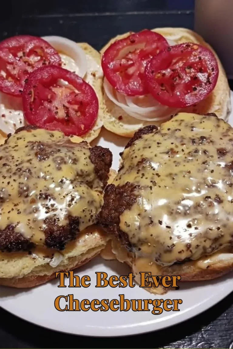 Delicious homemade cheeseburger with fresh toppings and melted cheese