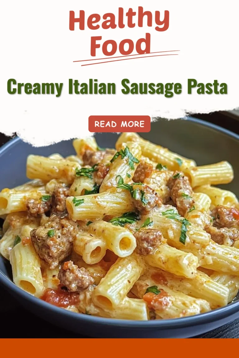 Creamy Italian sausage pasta dish served in a bowl with herbs and spices