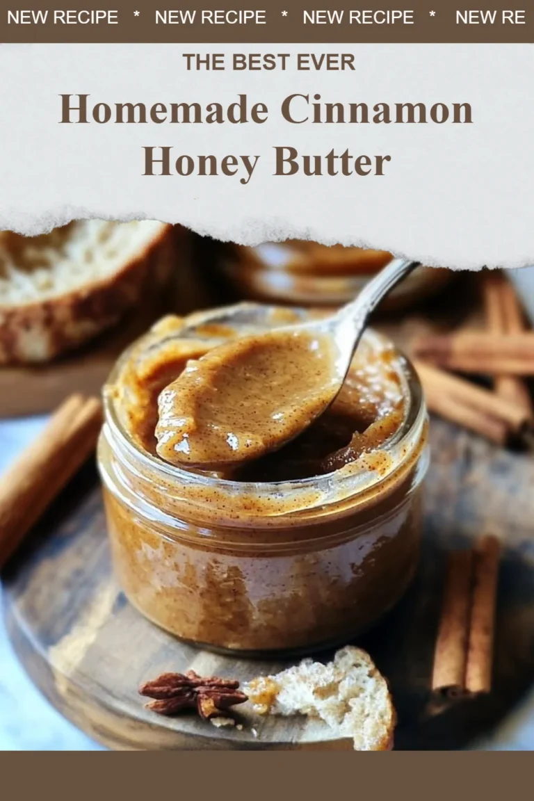 Homemade cinnamon honey butter spread in a glass jar with a knife